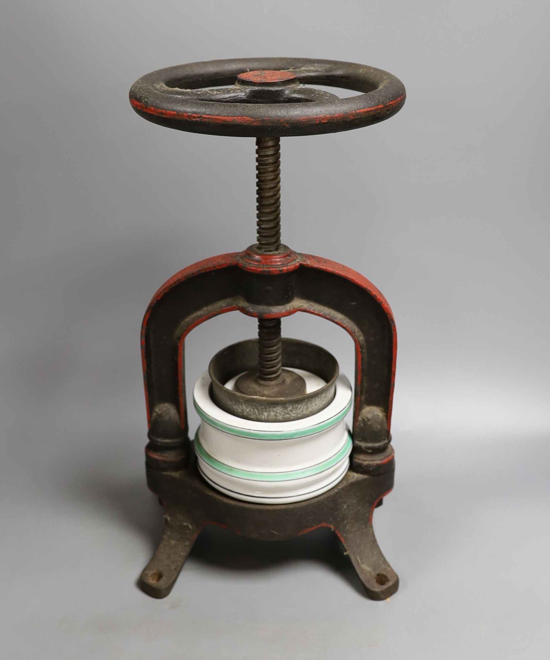A French cast iron and ceramic pâté press, 39 cm high